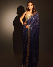 Celebrity style: blue sequins saree