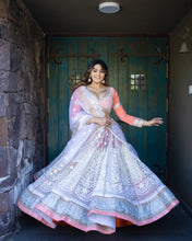 Bollywood inspired white and orange Lehenga