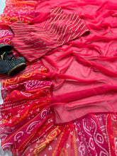 Partywear saree with a touch of bandhani printed ruffle