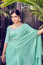 Mint green ruffle saree in organza