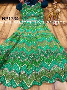 Gorgeous blend of green bandhani lehenga