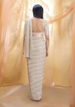 Celebrity style - ivory gold sequins saree