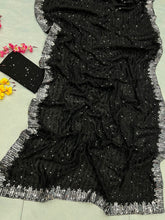 Celebrity style: black sequins saree