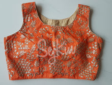 Orange silk blouse with zari work