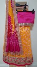 Bandhani lehenga - yellow and pink