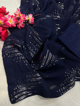 Partywear navy blue and silver zigzag sequins saree