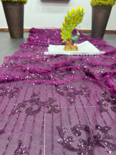 Partywear purple sequinned saree