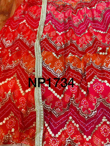 Gorgeous blend of red bandhani lehenga