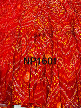 Niks collection - red bandhani gown with lots of flair