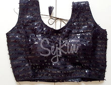 Black sequined blouse