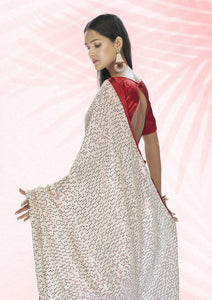 Off white party wear sequins saree