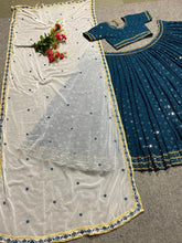 Teal blue party wear silk Lehenga