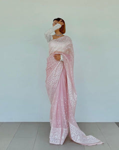 Celebrity style organza silk baby pink saree