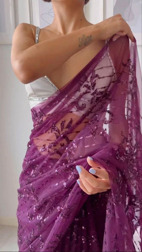 Partywear purple sequinned saree