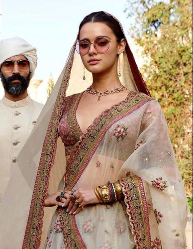 White beauty gold stone work saree