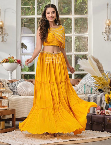 Yellow one shoulder cape Lehenga