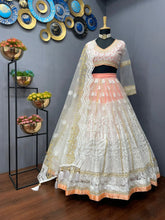 Bollywood inspired white and orange Lehenga