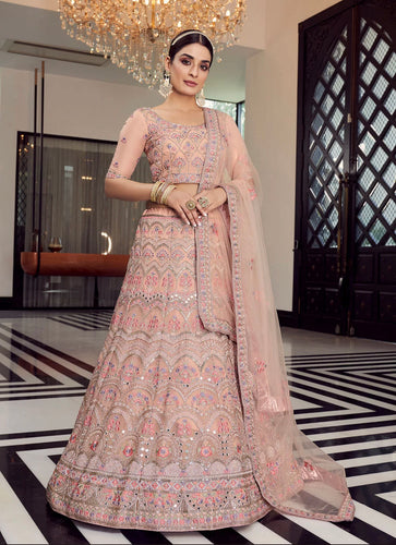 Kavya catalogue: Peach mirrror work Lehenga