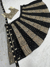 Black and gold Silk Lehenga