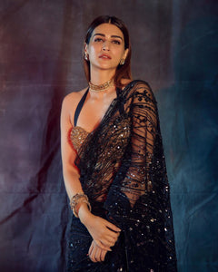 Partywear black net saree with sequins