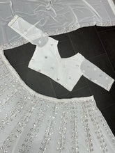 White beauty with sequins and mirror work