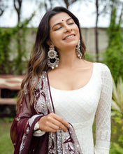 White embroidered gown