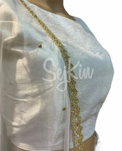 White and gold sequinned Lehenga