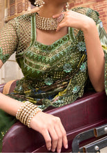 Heavy designer forest green partywear saree