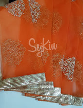 Orange net dupatta with jari work