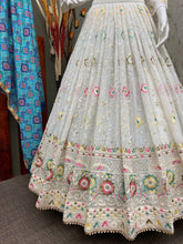 White and colourful threadwork Lehenga