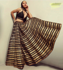 Sabyasachi inspired black and gold Lehenga