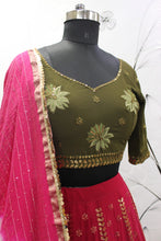 Deep pink and olive green Lehenga