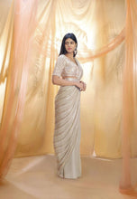 Celebrity style - ivory gold sequins saree