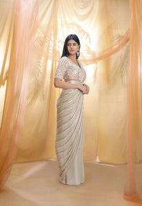 Celebrity style - ivory gold sequins saree
