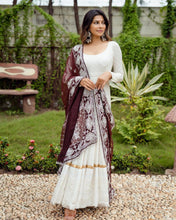 White embroidered gown