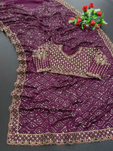 Magenta Kasturi silk sequinned saree