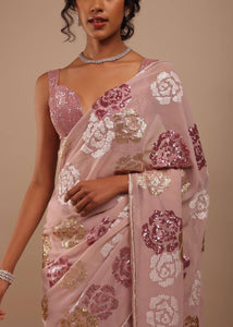 Partywear peachy pink saree