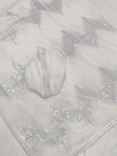 Celebrity inspired saree: white and silver sequinned saree