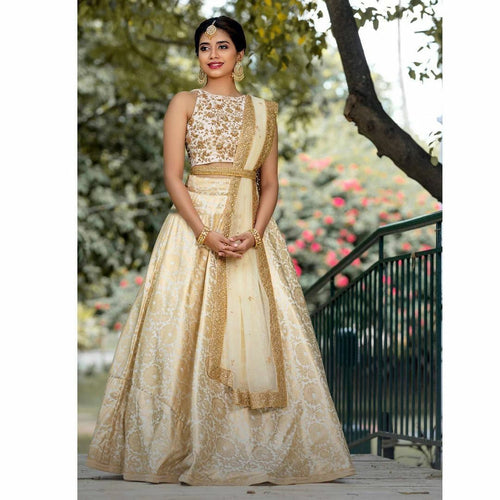 White and gold silk zari Lehenga