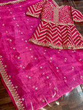 Organza saree with readymade peplum style blouse