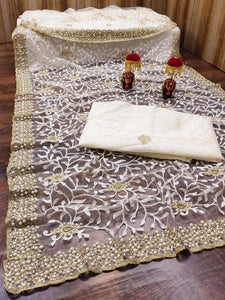 Pearl and stone work net sarees