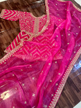 Organza saree with readymade peplum style blouse