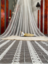 Off white net sequins embroidered saree