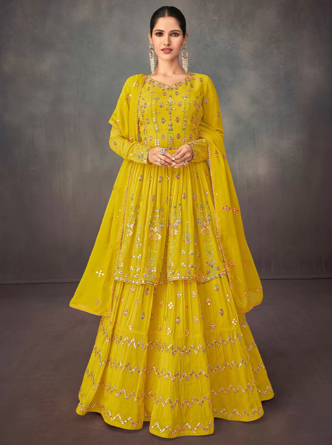 Sunaish - Yellow long top Lehenga