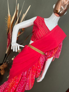 Partywear saree with a touch of bandhani printed ruffle