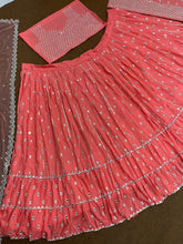 Coral pink ruffles Lehenga