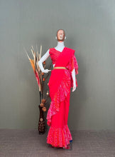 Partywear saree with a touch of bandhani printed ruffle