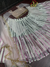 Partywear Lehenga with two sequinned colours