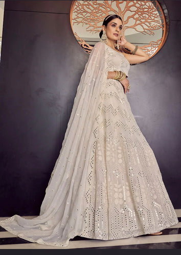 Kavya catalogue: Stunning White mirror work Lehenga