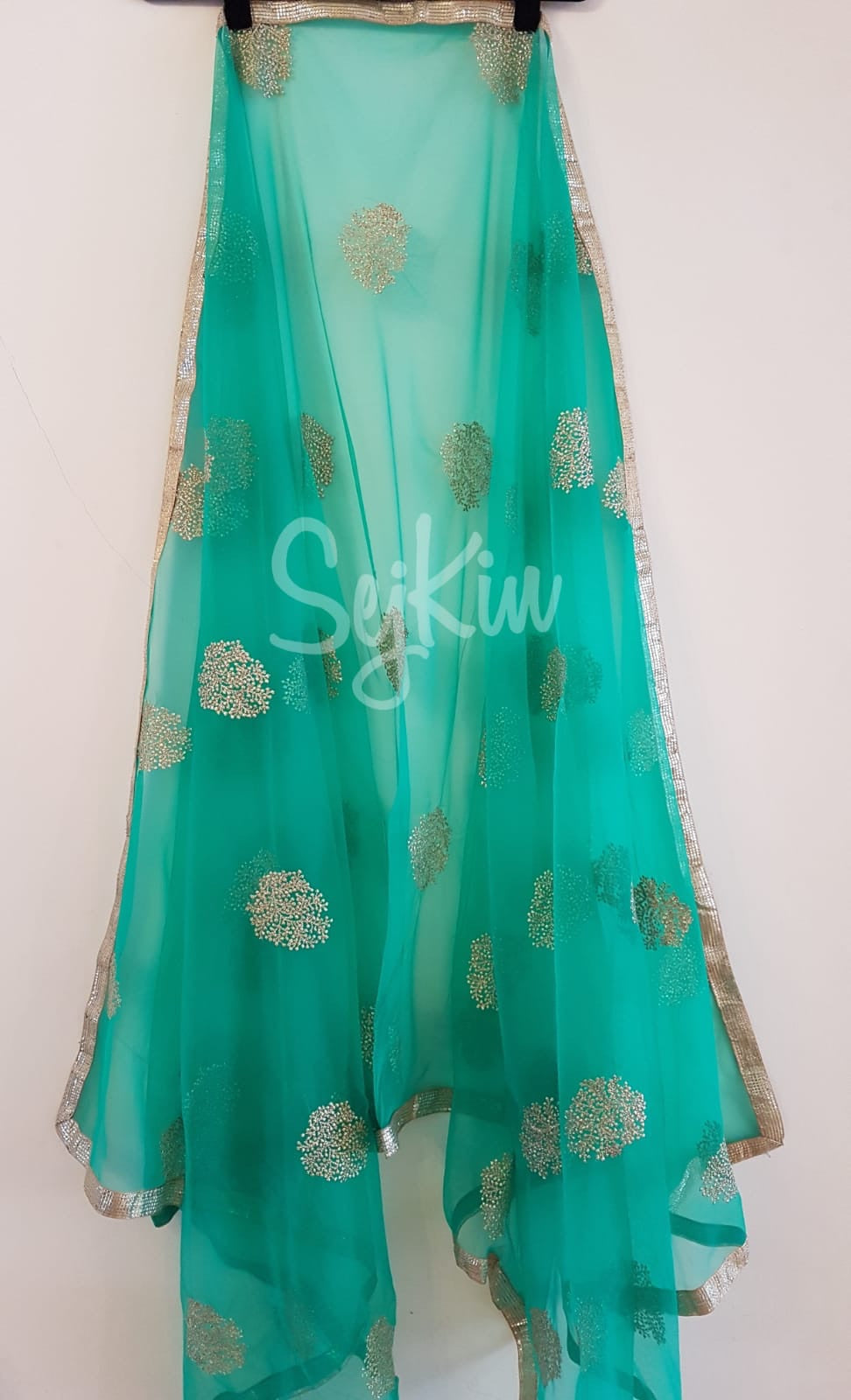 Green with gold embellished net dupatta
